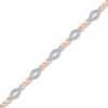 Thumbnail Image 1 of 1/4 CT. T.W. Diamond Alternating Marquise Outline Twist Line Bracelet in 10K Two-Tone Gold