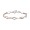 Thumbnail Image 2 of 1/4 CT. T.W. Diamond Alternating Marquise Outline Twist Line Bracelet in 10K Two-Tone Gold