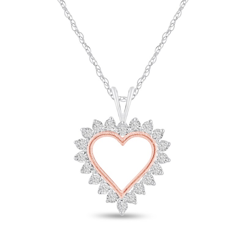 1/15 CT. T.W. Diamond Starburst Frame Open Heart Pendant in 10K Two-Tone Gold