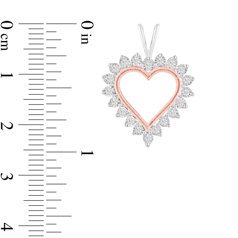 1/15 CT. T.W. Diamond Starburst Frame Open Heart Pendant in 10K Two-Tone Gold