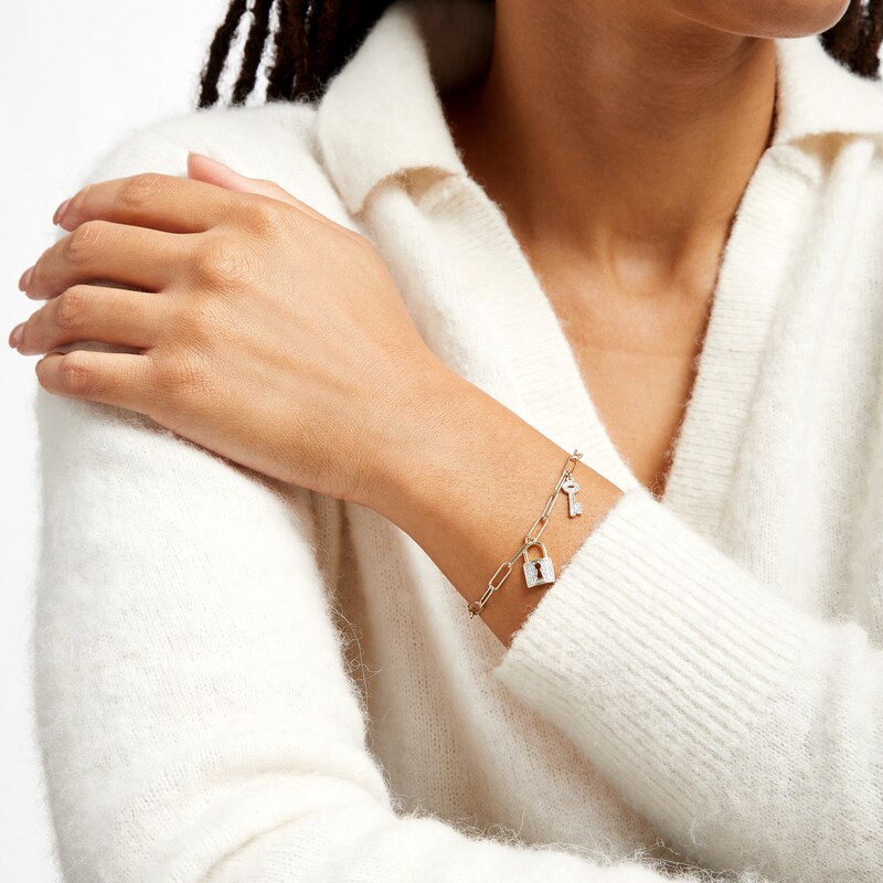Main Image 2 of 1/5 CT. T.W. Diamond Lock and Key Dangle Charm Paper Clip Link Bracelet in Sterling Silver with 14K Gold Plate