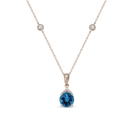 7.0mm London Blue Topaz and 1/10 CT. T.W. Diamond Pendant in 10K Gold