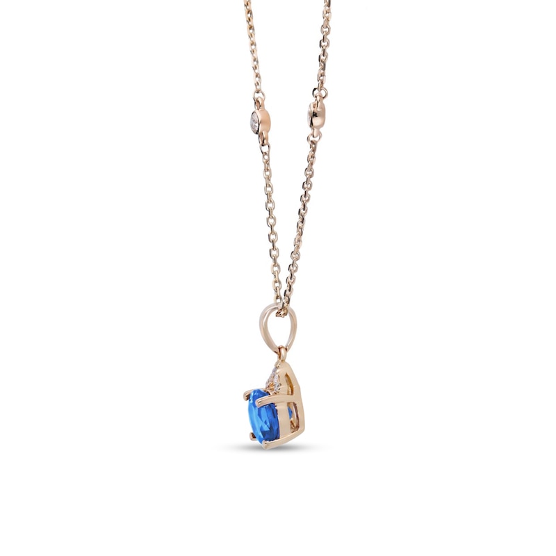 Main Image 2 of 7.0mm London Blue Topaz and 1/10 CT. T.W. Diamond Pendant in 10K Gold