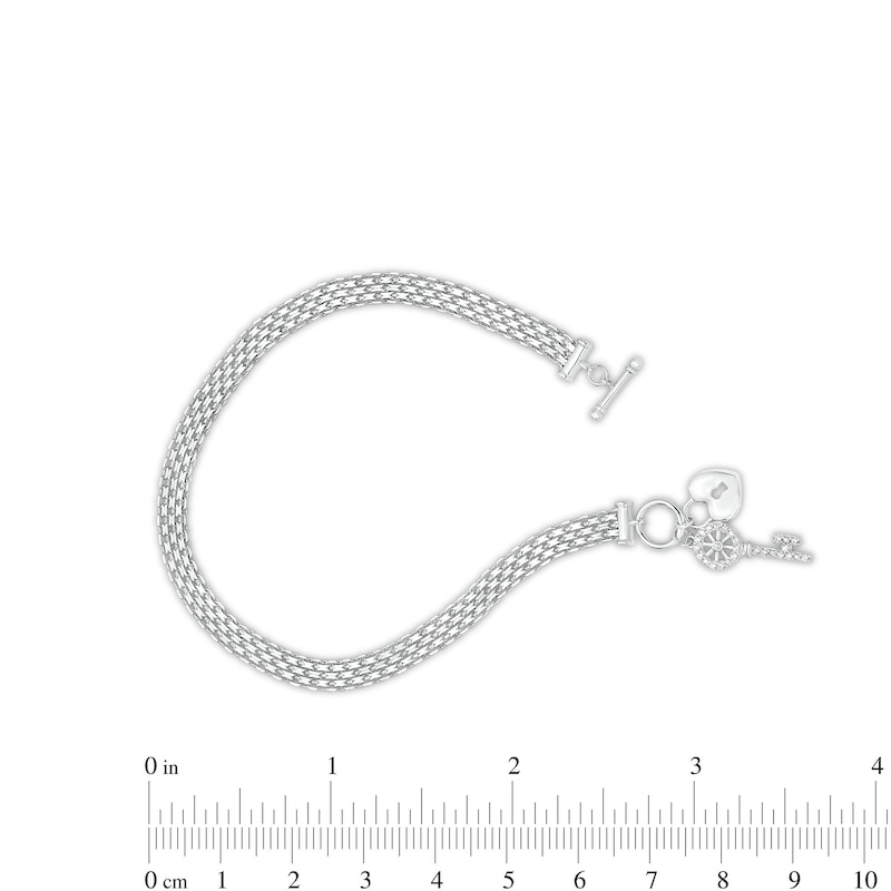 Main Image 4 of 1/10 CT. T.W. Diamond Heart Lock and Key Dangle Charm Bracelet in Sterling Silver - 7.25"