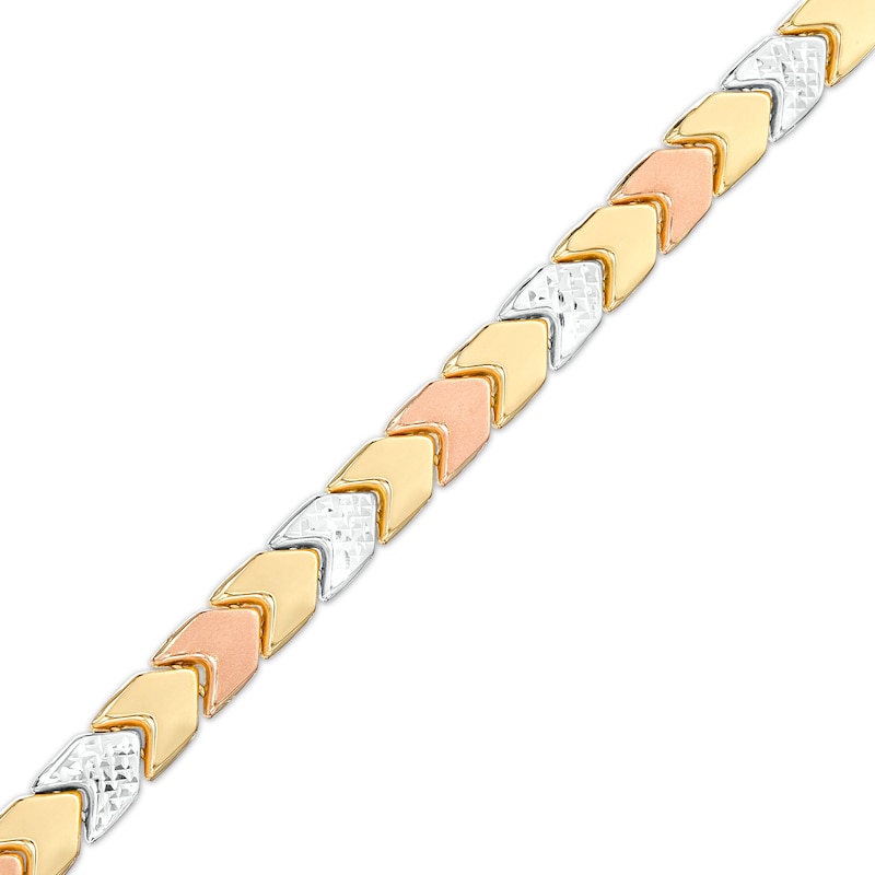 Main Image 1 of 5.23mm Alternating Chevron Stampato Bracelet in Hollow 10K Tri-Tone Gold – 7.25&quot;