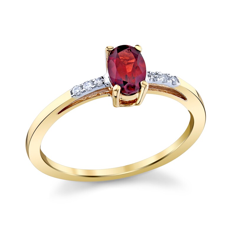 Main Image 1 of Oval Garnet and 1/20 CT. T.W. Diamond Ring in 14K Gold