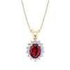 Thumbnail Image 1 of Oval Garnet and 1/5 CT. T.W. Diamond Sunburst Frame Split Bale Pendant in 14K Gold