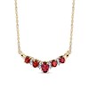 Thumbnail Image 1 of Oval Garnet and 1/8 CT. T.W. Diamond Alternating "V" Necklace in 14K Gold – 16"