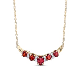 Oval Garnet and 1/8 CT. T.W. Diamond Alternating "V" Necklace in 14K Gold – 16"