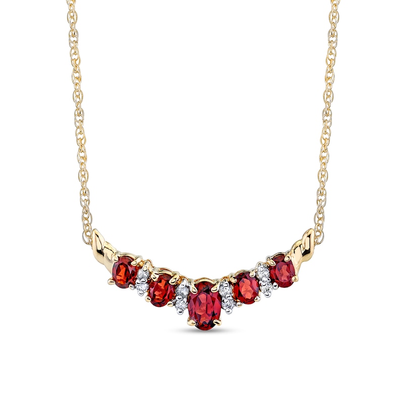 Main Image 1 of Oval Garnet and 1/8 CT. T.W. Diamond Alternating "V" Necklace in 14K Gold – 16"