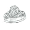 Thumbnail Image 1 of 1/4 CT. T.W. Oval Multi-Diamond Double Frame Loop Sides Split Shank Bridal Set in Sterling Silver