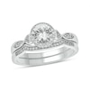 Thumbnail Image 1 of 6.0mm White Lab-Created Sapphire and 1/5 CT. T.W. Diamond Frame Twist Shank Bridal Set in Sterling Silver