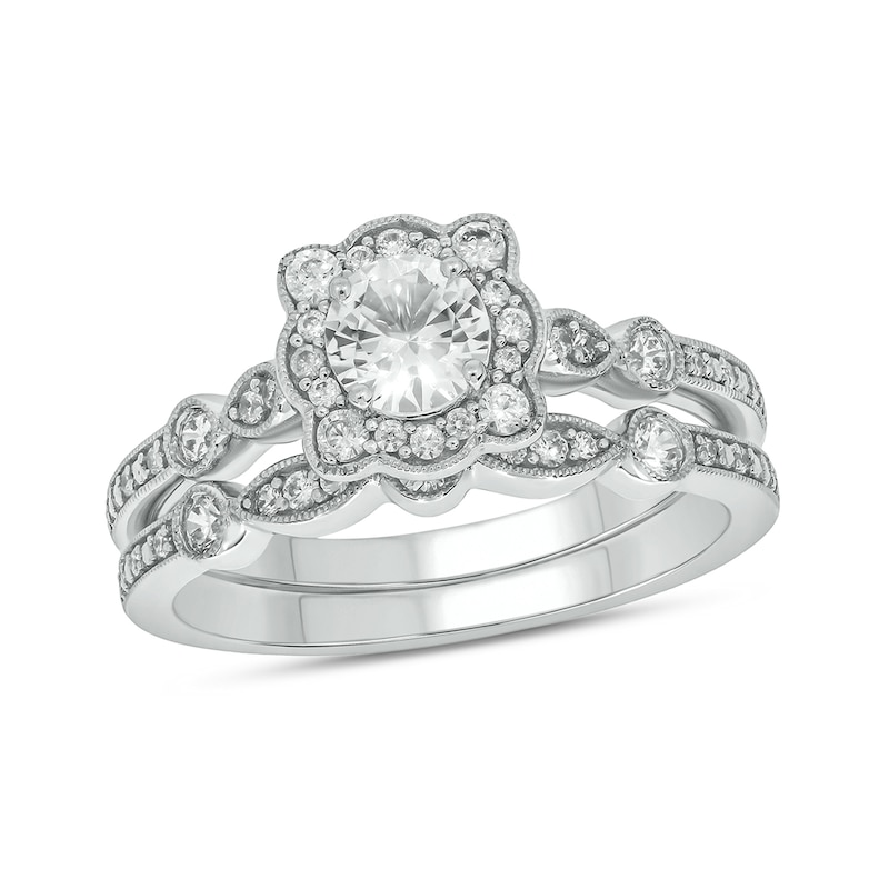 Main Image 1 of 5.0mm White Lab-Created Sapphire and 1/3 CT. T.W. Diamond Floral Frame Vintage-Style Bridal Set in Sterling Silver