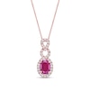 Thumbnail Image 0 of Oval Ruby and 1/5 CT. T.W. Diamond Loop Frame Doorknocker Drop Pendant in 10K Rose Gold