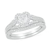 Thumbnail Image 1 of 1/5 CT. T.W. Heart-Shaped Multi-Diamond Frame Tapered Shank Bridal Set in Sterling Silver