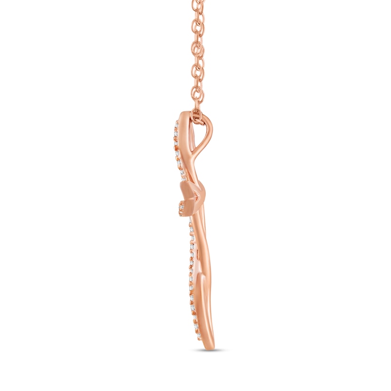 Main Image 3 of 1/6 CT. T.W. Diamond Twist Ribbon Cross Pendant in Sterling Silver with 14K Rose Gold Plate