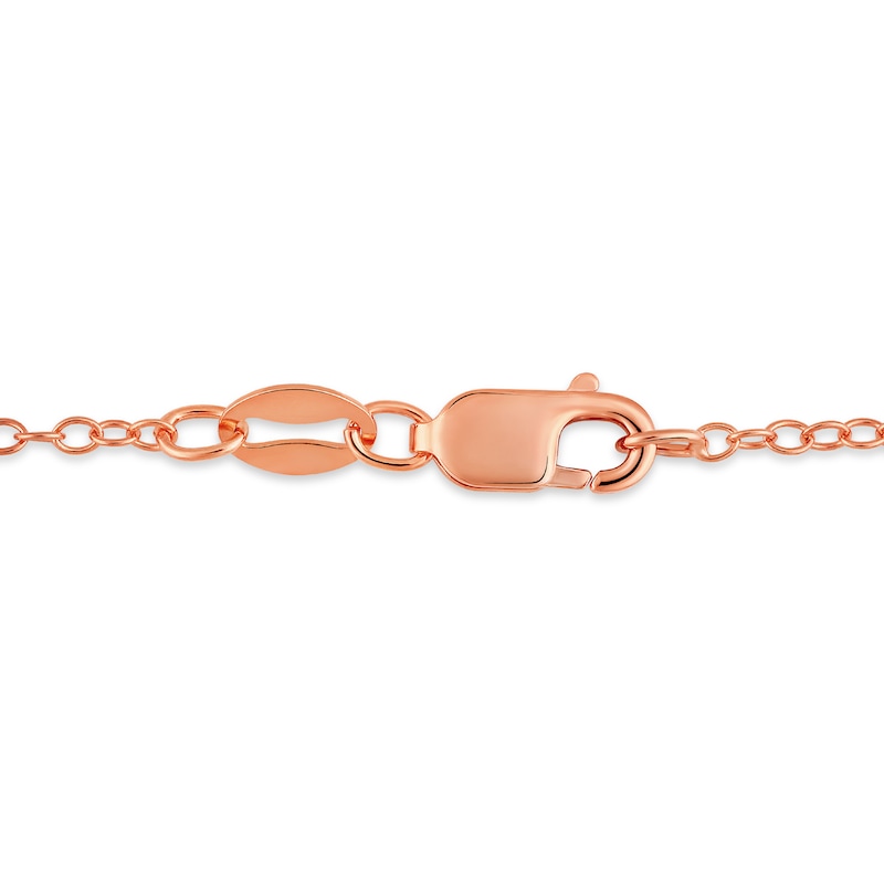 Main Image 5 of 1/6 CT. T.W. Diamond Twist Ribbon Cross Pendant in Sterling Silver with 14K Rose Gold Plate