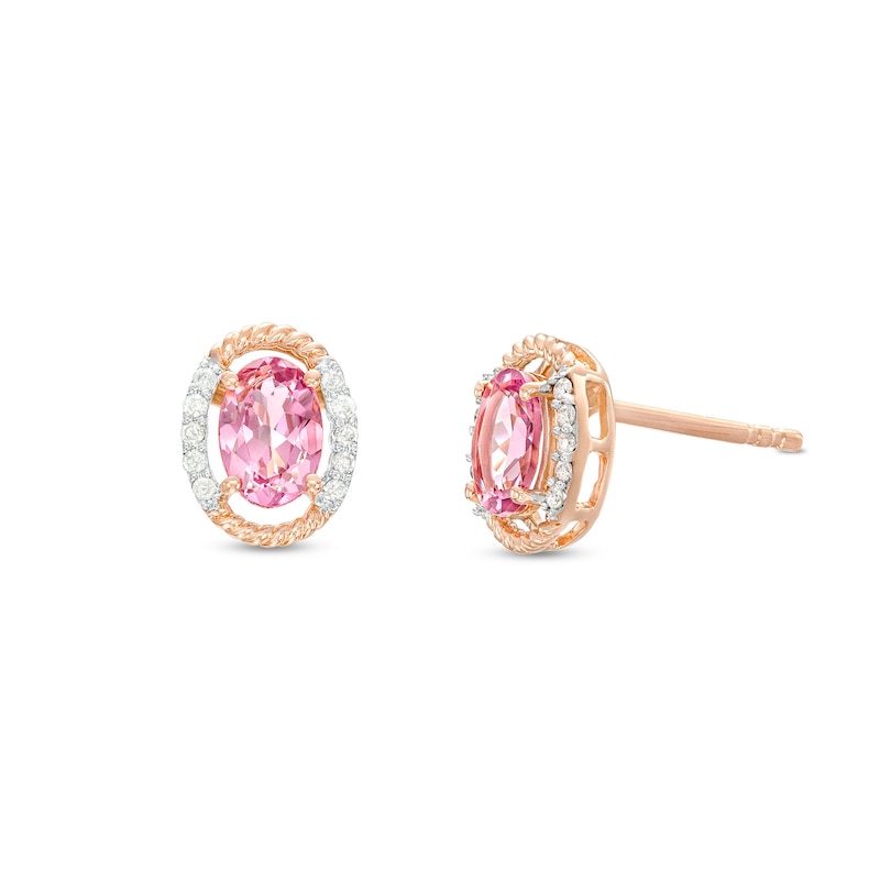 Main Image 1 of Oval Pink Garnet and 1/15 CT. T.W. Diamond Open Rope-Textured Frame Stud Earrings in 10K Rose Gold