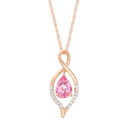 Pear-Shaped Garnet and 1/20 CT. T.W. Diamond Loop Pendant in 10K Rose Gold