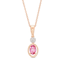 Oval Garnet and Multi-Diamond Accent Textured Open Frame Pendant in 10K Rose Gold