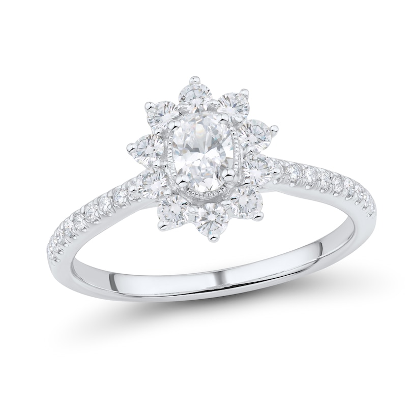 Main Image 1 of 1 CT. T.W. Oval Diamond Starburst Frame Vintage-Style Ring in 14K White Gold (I/I1)