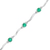 Thumbnail Image 1 of Lab-Created Emerald and Diamond Accent Station Wavy Line Bracelet in Sterling Silver - 7.5"