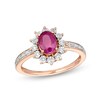 Thumbnail Image 1 of Oval Ruby and 1/20 CT. T.W. Diamond Sunburst Frame Ring in 10K Rose Gold