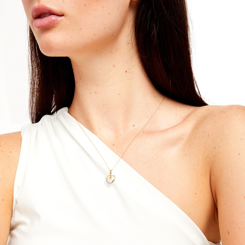 Main Image 2 of Swiss Blue Topaz Knotted Heart Pendant in 10K Gold