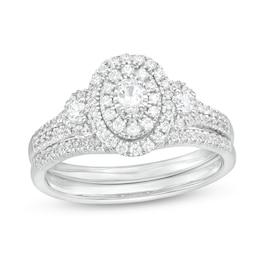 5/8 CT. T.W. Oval Multi-Diamond Frame Three Stone Double Row Split Shank Bridal Set in 10K White Gold