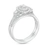 Thumbnail Image 3 of 5/8 CT. T.W. Oval Multi-Diamond Frame Three Stone Double Row Split Shank Bridal Set in 10K White Gold
