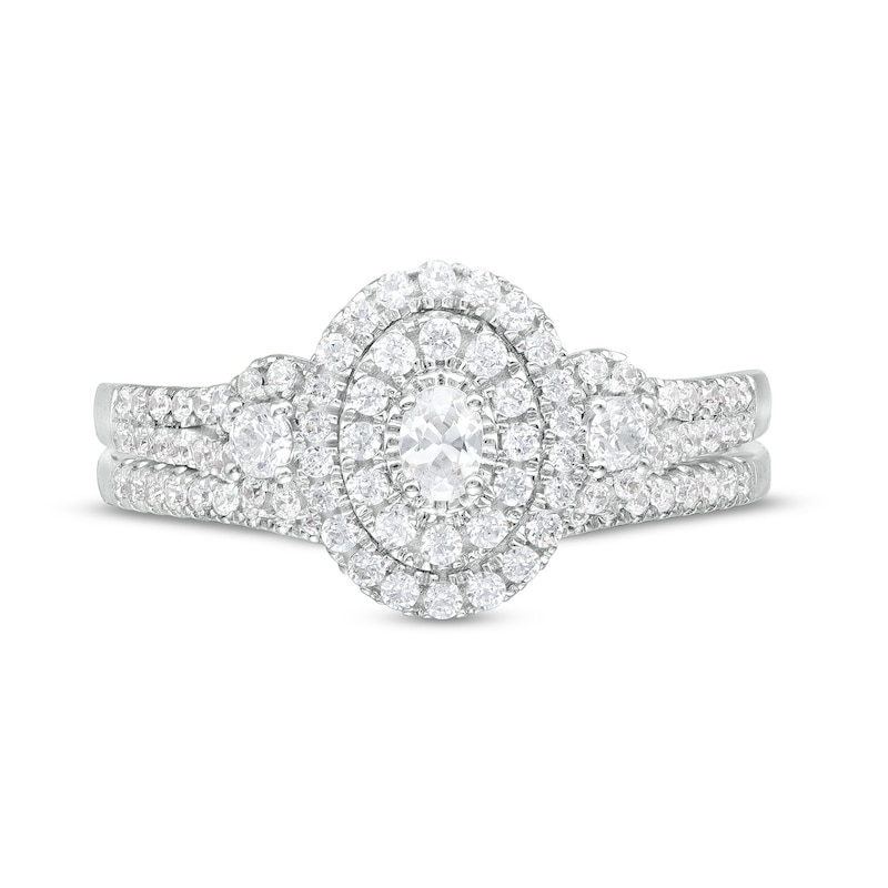 Main Image 4 of 5/8 CT. T.W. Oval Multi-Diamond Frame Three Stone Double Row Split Shank Bridal Set in 10K White Gold