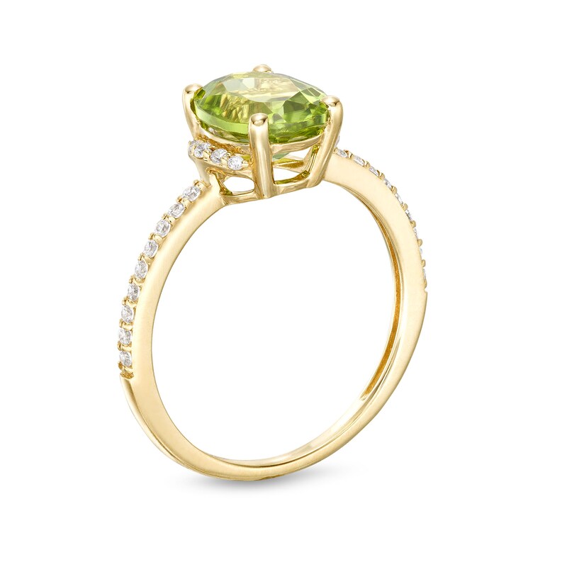 Main Image 3 of Oval Peridot and 1/10 CT. T.W. Diamond Hidden Frame Ring in 10K Gold