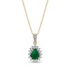 Thumbnail Image 0 of Pear-Shaped Emerald and 1/4 CT. T.W. Diamond Sunburst Frame Pendant in 14K Gold