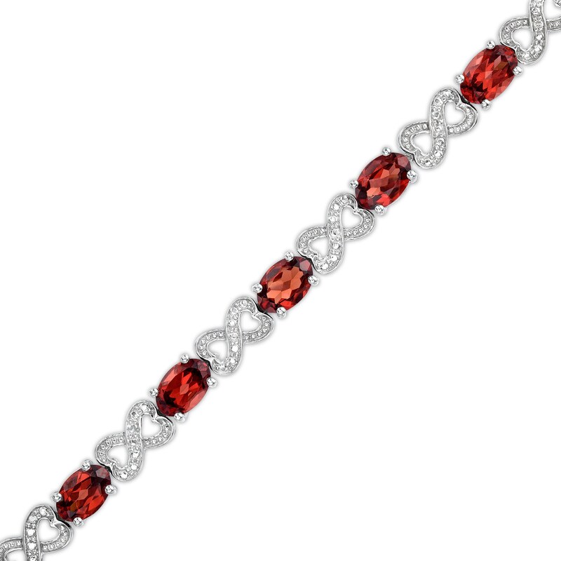 Main Image 1 of Oval Garnet and Diamond Accent Heart-Shaped Infinity Line Bracelet in Sterling Silver - 7.25"