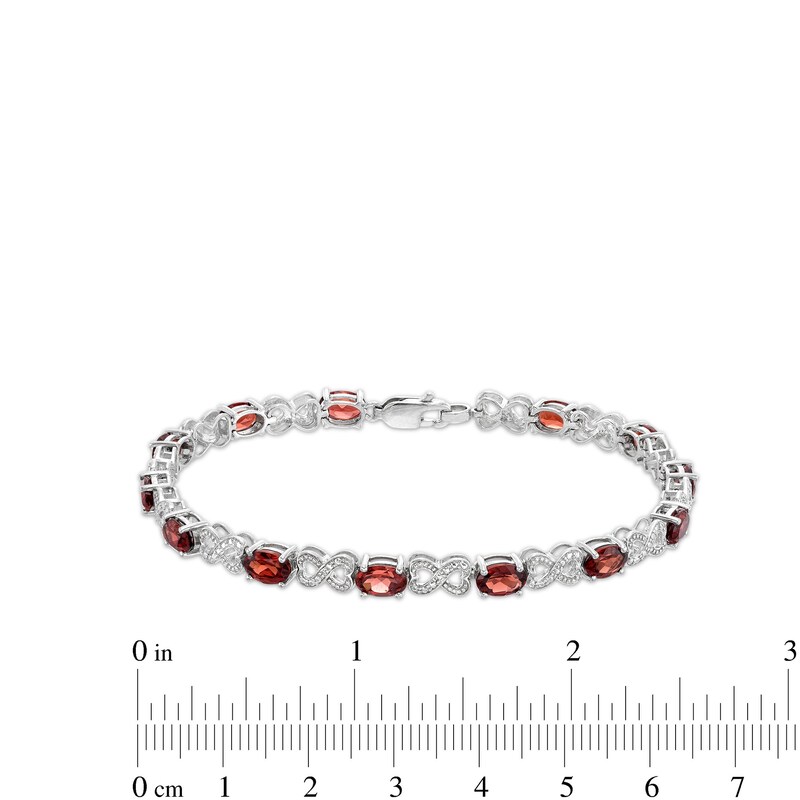 Main Image 4 of Oval Garnet and Diamond Accent Heart-Shaped Infinity Line Bracelet in Sterling Silver - 7.25"