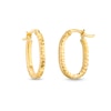 Thumbnail Image 1 of Diamond-Cut Oval Hoop Earrings in Hollow 14K Gold