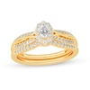 Thumbnail Image 1 of 1/2 CT. T.W. Oval Diamond Frame Overlay Bridal Set in 14K Gold