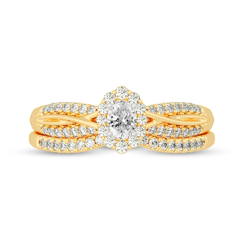 Main Image 3 of 1/2 CT. T.W. Oval Diamond Frame Overlay Bridal Set in 14K Gold