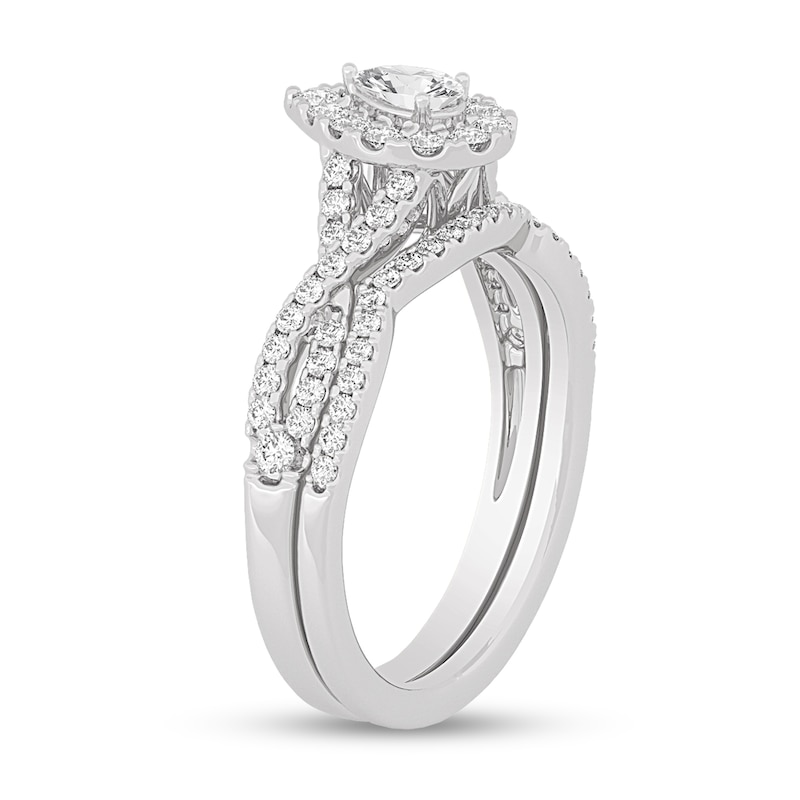 Main Image 2 of 3/4 CT. T.W. Pear-Shaped Diamond Frame Twist Shank Bridal Set in 14K White Gold (I/SI2)