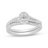 Thumbnail Image 1 of 3/8 CT. T.W. Oval Diamond Frame Bypass Bridal Set in 14K White Gold (I/SI2)