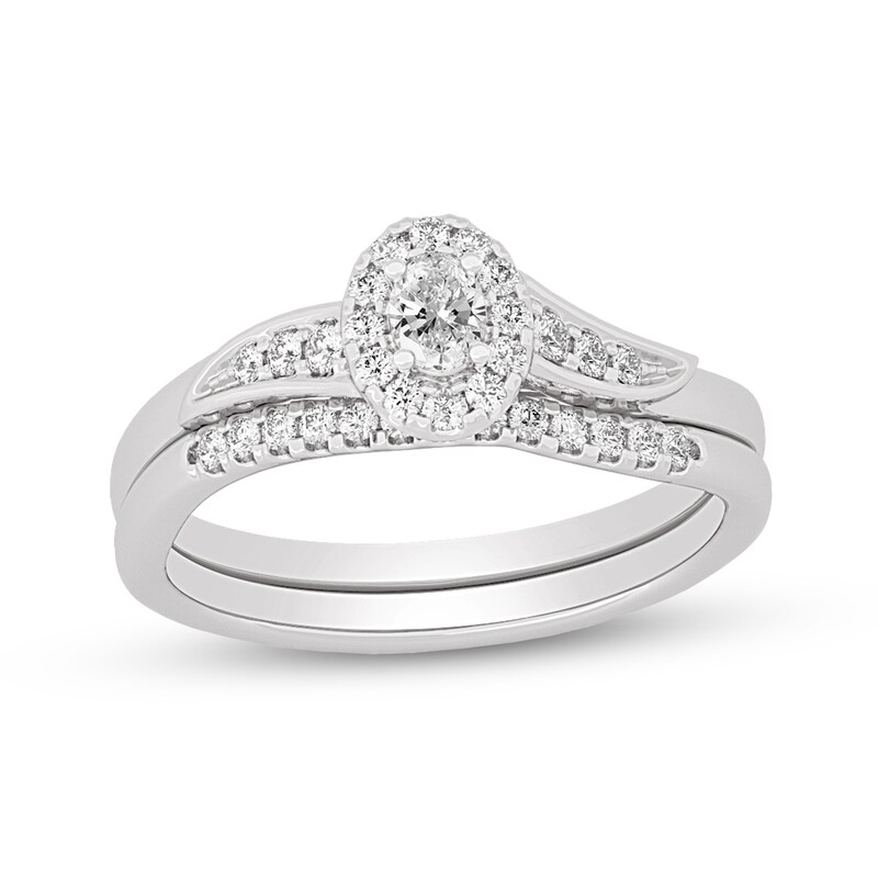 Main Image 1 of 3/8 CT. T.W. Oval Diamond Frame Bypass Bridal Set in 14K White Gold (I/SI2)