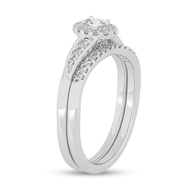 Main Image 2 of 3/8 CT. T.W. Oval Diamond Frame Bypass Bridal Set in 14K White Gold (I/SI2)