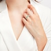 Thumbnail Image 2 of Sideways Emerald-Cut Emerald and 1/15 CT. T.W. Diamond Station Three Stone Ring in 14K White Gold