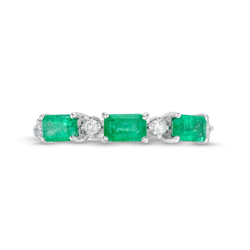 Main Image 4 of Sideways Emerald-Cut Emerald and 1/15 CT. T.W. Diamond Station Three Stone Ring in 14K White Gold