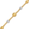 Thumbnail Image 1 of Oro Diamante™ Graduating Brilliance Bead Bracelet in Hollow 14K Two-Tone Gold - 7.5"