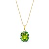 Thumbnail Image 1 of Oval Peridot, Tsavorite and 1/8 CT. T.W. Diamond Frame Pendant in 10K Gold