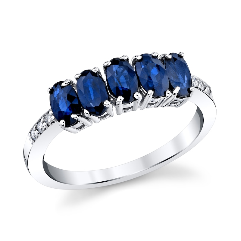 Main Image 1 of Oval Blue Sapphire and 1/20 CT. T.W. Diamond Five Stone Ring in 14K White Gold
