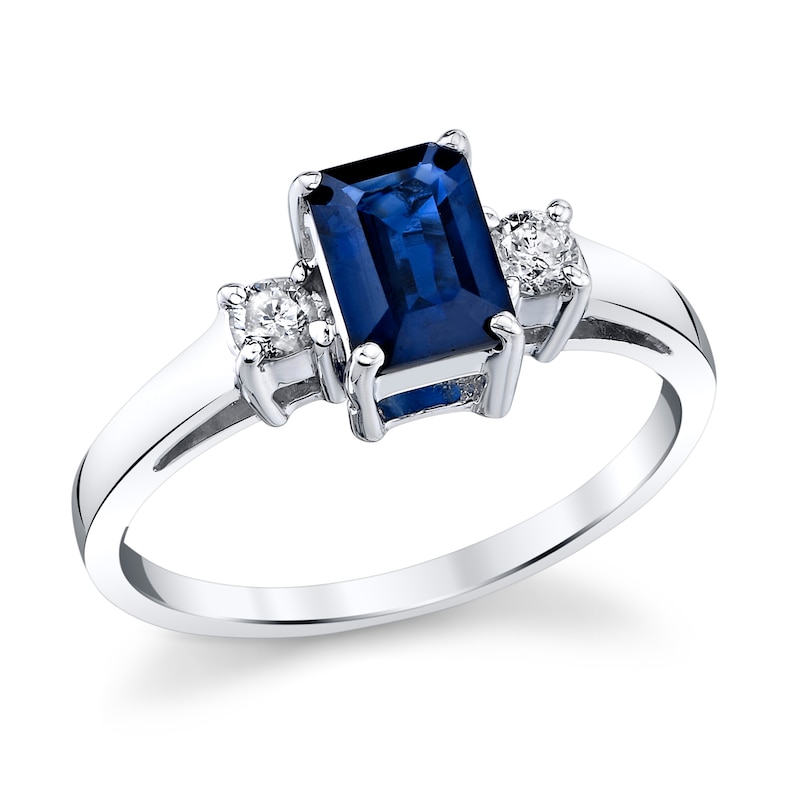 Main Image 1 of Emerald-Cut Blue Sapphire and 1/6 CT. T.W. Diamond Three Stone Ring in 14K White Gold