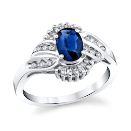 Oval Blue Sapphire and 1/3 CT. T.W. Diamond Fan Frame Ring in 14K White Gold