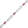 Thumbnail Image 0 of Oval Lab-Created Ruby and Diamond Accent Infinity Braid Line Bracelet in Sterling Silver - 7.25"